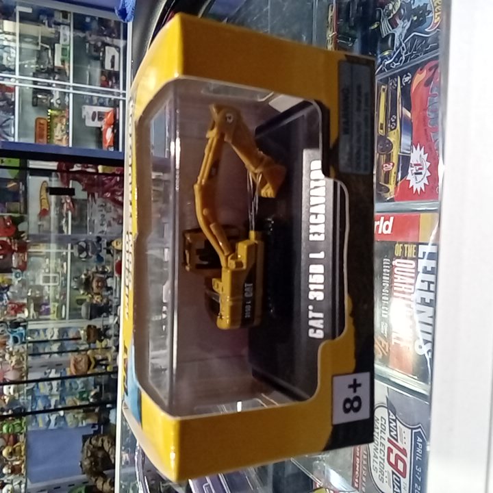 NORSCOT CATERPILLAR MINI CAT EXCAVATOR 187 SCALE DIECAST